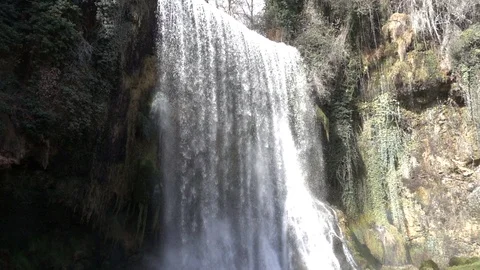 Waterfall at slow motion in the stone monastery Stock Footage 87601558