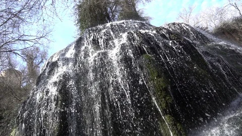Waterfall at slow motion in the stone monastery Stock Footage 87603130