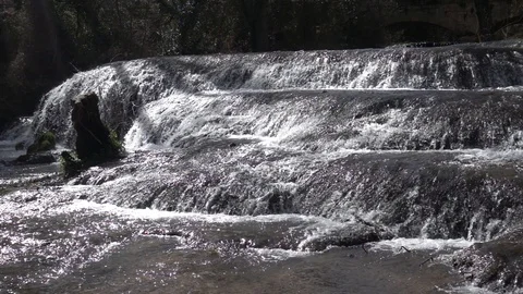 Waterfall at slow motion in the stone monastery Stock Footage 87737566
