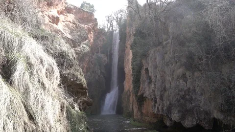 Waterfall at slow motion in the stone monastery Stock Footage 87750425