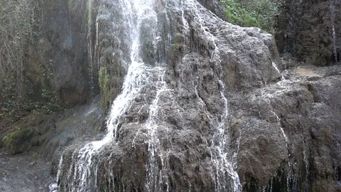 Waterfall at slow motion in the stone monastery Stock Footage 87750476