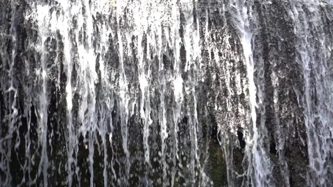 Waterfall at slow motion in the stone monastery Stock Footage 87755938