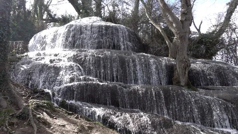 Waterfall at slow motion in the stone monastery Video stock 87757438