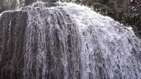 Waterfall at slow motion in the stone monastery Video stock 87757674
