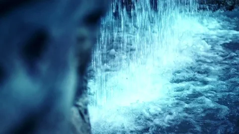 Waterfall slow motion. Water stream flowing over rocks. Flowing water Video stock 76558974