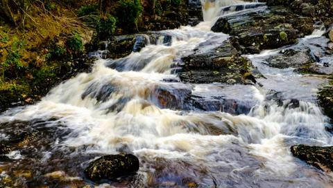 Waterfall on a small stream flowing into the River Etive, Highlands of Scotla Stock Photos
