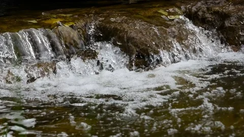 Waterfall on a small stream Stock Footage 76028206