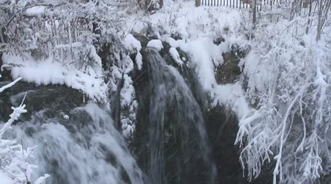 Waterfall in Snowstorm Stock Footage 8983965