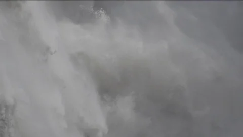 Waterfall splashing after falling down at a great speed, Iceland Stock Footage 69741377