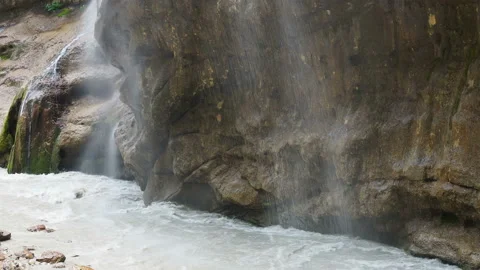 Waterfall splashing on the rocks. super clean and cold waterfall Stock Footage 131991359