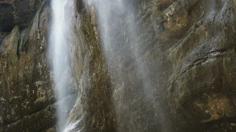 Waterfall splashing on the rocks. super clean and cold waterfall Stock Footage 131991683