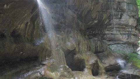 Waterfall splashing on the rocks. super clean and cold waterfall Stock Footage 131992926