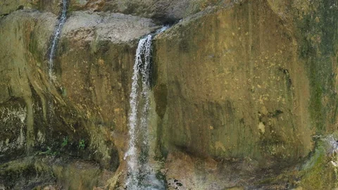 Waterfall splashing on the rocks. super clean and cold waterfall Stock Footage 131993869