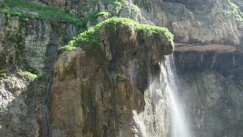 Waterfall splashing on the rocks. super clean and cold waterfall Stock Footage 131994994