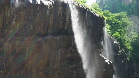 Waterfall splashing on the rocks. super clean and cold waterfall Stock Footage 131995202