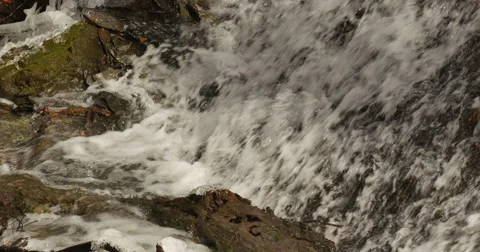 Waterfall in spring time with icicles on the rocks Vídeo Stock 60920979