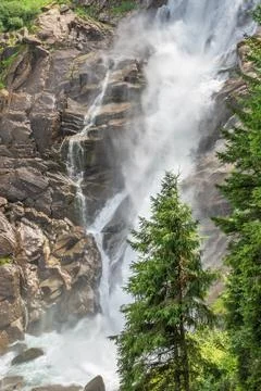 Waterfall with spruce tree Stock Photos