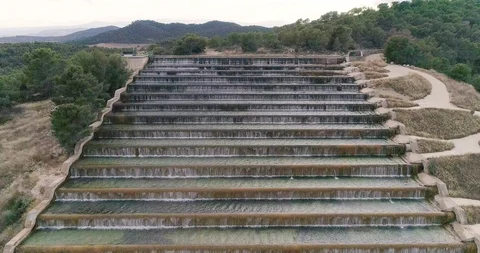 Waterfall staircase front view from drone up Stock Footage 124379298