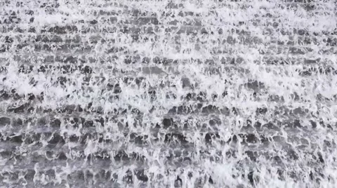 Waterfall on steps in town Stock Footage 66373223