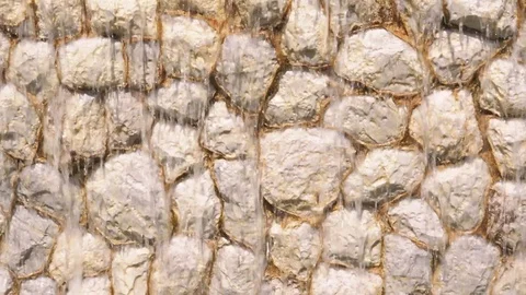  Waterfall on stone wall background. Stock Footage 125392469