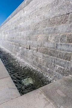 Waterfall stone wall Stock Photos