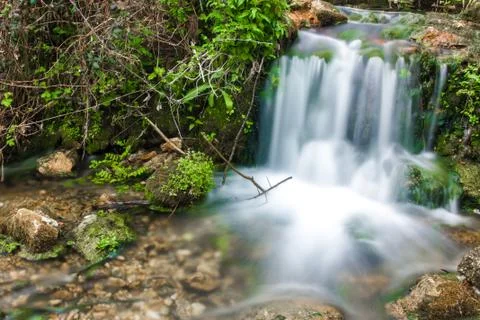 Waterfall with stones Stock Photos