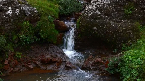 Waterfall on a stream and rocks Stock Footage 318728578
