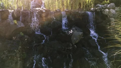 Waterfall from the stream to the lake of the mansion Video stock 138113071