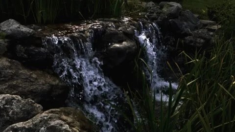 Waterfall from the stream to the lake of the mansion Video stock 138113097