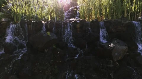 Waterfall from the stream to the lake of the mansion Video stock 138113103