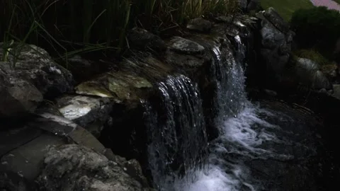 Waterfall from the stream to the lake of the mansion Video stock 138113146