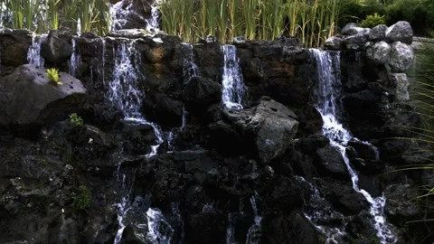 Waterfall from the stream to the lake of the mansion Video stock 138113259