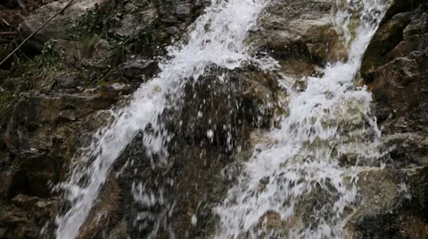 Waterfall. the stream of water flowing over rocks Video stock 31558739
