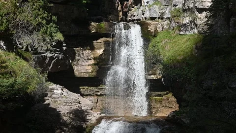 Waterfall in summer sunlight Stock Footage 260825238