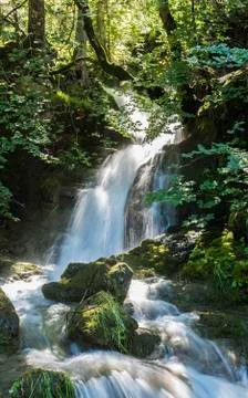 Waterfall in the Sun Austria Stock Photos