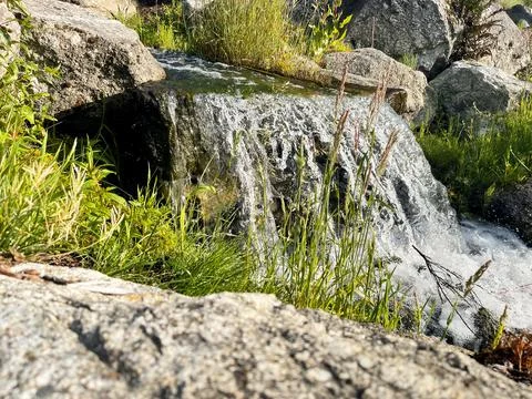 A waterfall in the sunshine Stock Photos