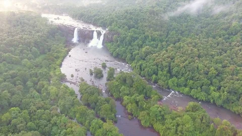 Waterfall Surrounded By Lush Green Forest Aerial View 動画素材 71823725