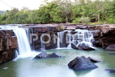 Waterfall tadtone in climate forest of thailand top perspective Stock Photos