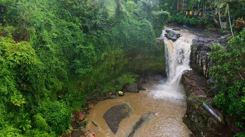 Waterfall Tegenungan ,surrounded by rainforest. Stock Footage 128448420