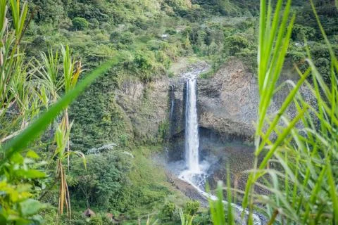 Waterfall through the grass Stock Photos