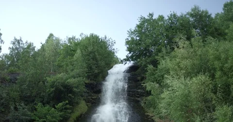 Waterfall Through Trees On Slope Stock Footage 82277391