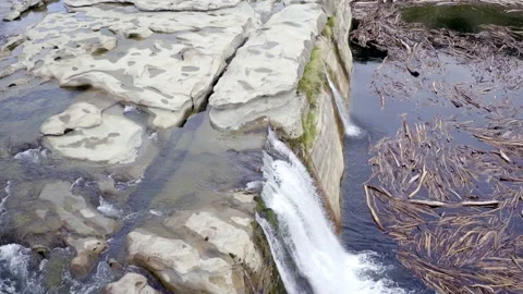 Waterfall top tracking back to reveal more waterfalls drone Stock Footage 155609046