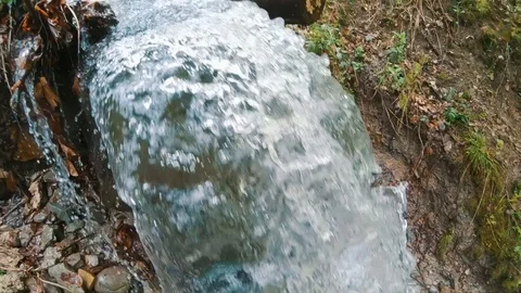 Waterfall in a transparent mountain stream Stock Footage 107325741