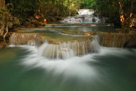 Waterfall with tree and rock view Stock Photos