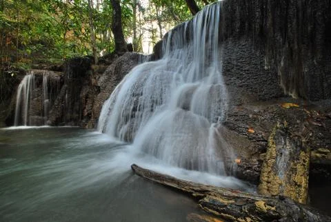Waterfall with tree and rock view Stock Photos