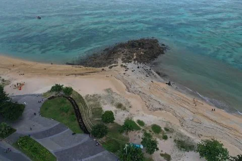 Waterfall on tropical mountain, Java, Indonesia. Stock Photos