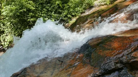 Waterfall in tropical rain-forest Stock Footage 57313386