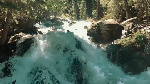 Waterfall Tumbling Down the Mountain 库存影片 128751614