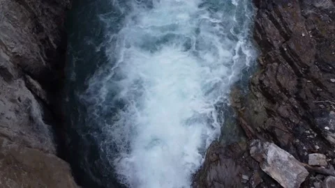 Waterfall Tumbling into Small Pond Top Down View Stock Footage 162857353