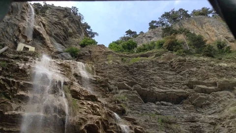 Waterfall Ucan Suv . Water flows down the rocks close up . Crimea Russia 5 Stock Footage 87094490